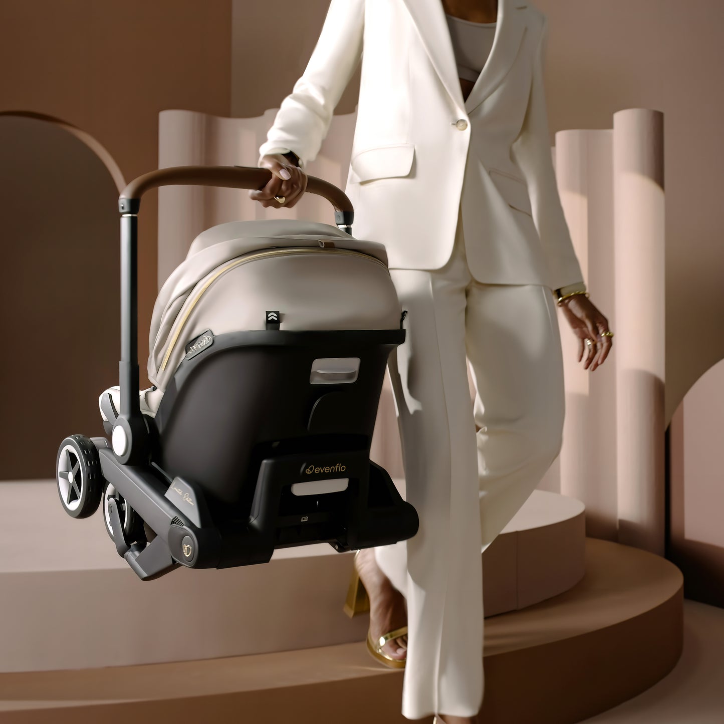 Evenflo - Shyft DualRide with Carryall Storage Infant Car Seat and Stroller Combo with Green & Gentle Fabric - Champagne