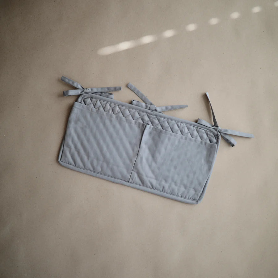 Mushie - Crib Pocket Tradewinds