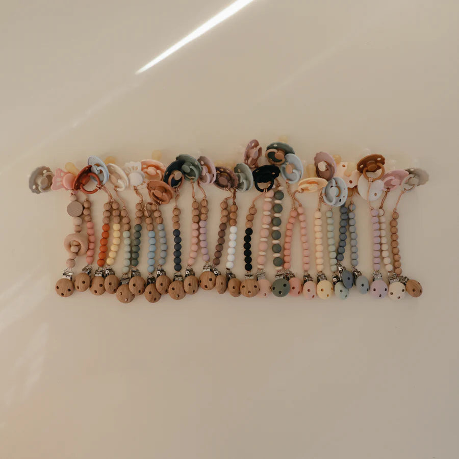 Mushie - Silicone Pacifier Clip - Hera Shifting Sands